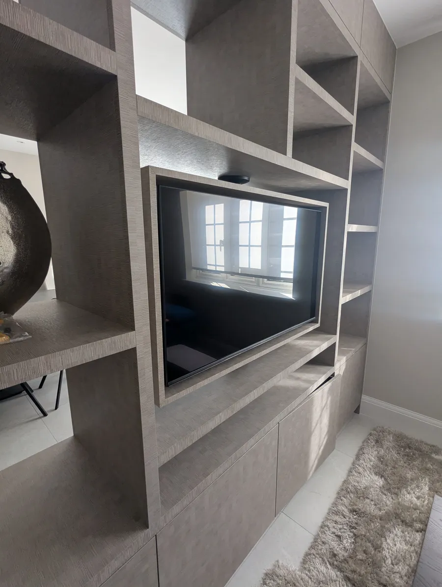 Display unit with swivel TV